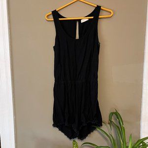 Black Romper with Lace and Cutout Details
